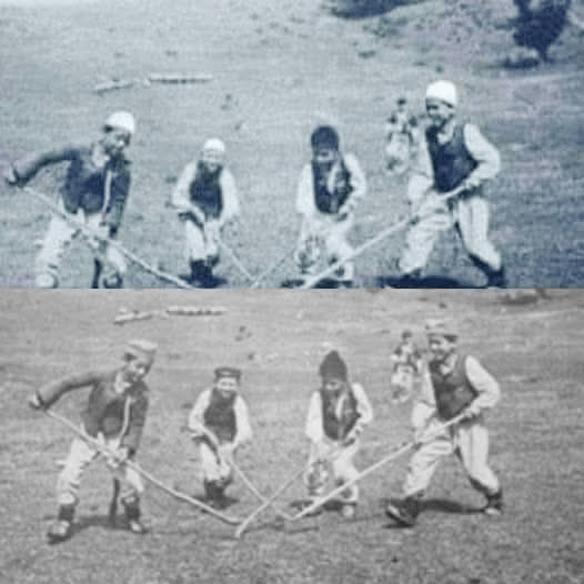 Traditional Albanian game with sticks and a ball on the&nbsp;grass.