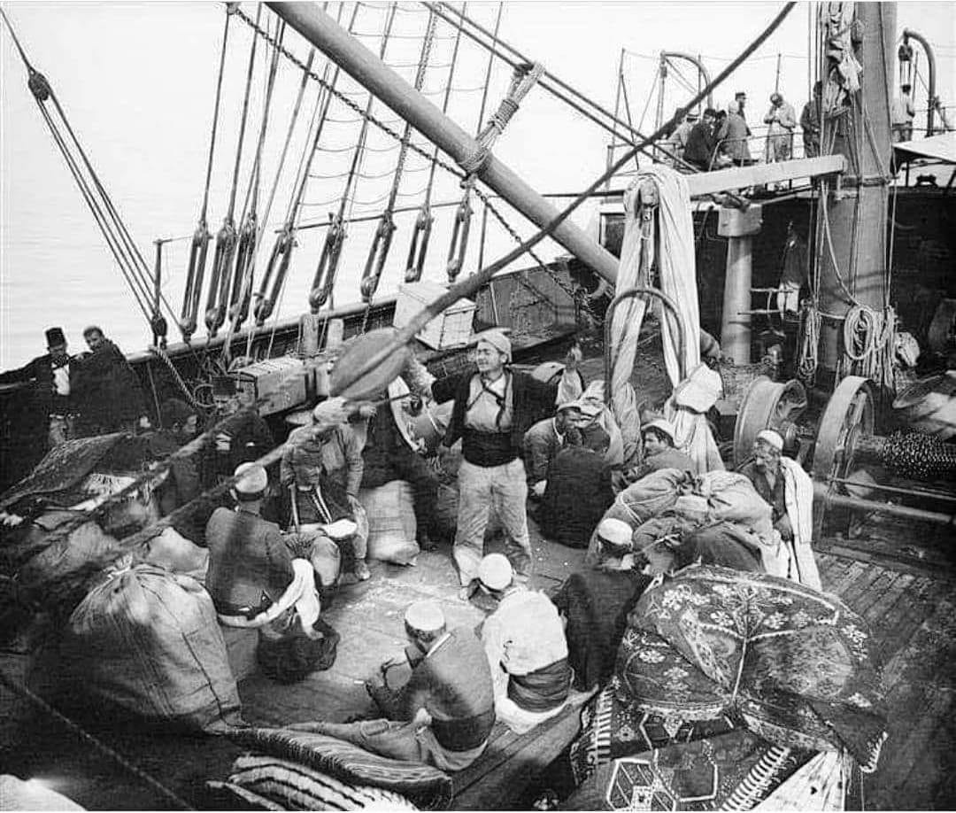 Photo of Albanians dancing on a ship between Patras and Corfu in 1903