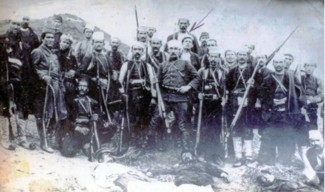 Devollin Albanian fighters posing with executed Greek soldiers in 1914