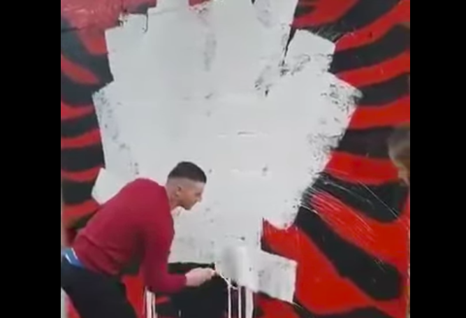 Serbs scratching the Albanian flag in the Cem River, in the municipality of Tuzi in 2020