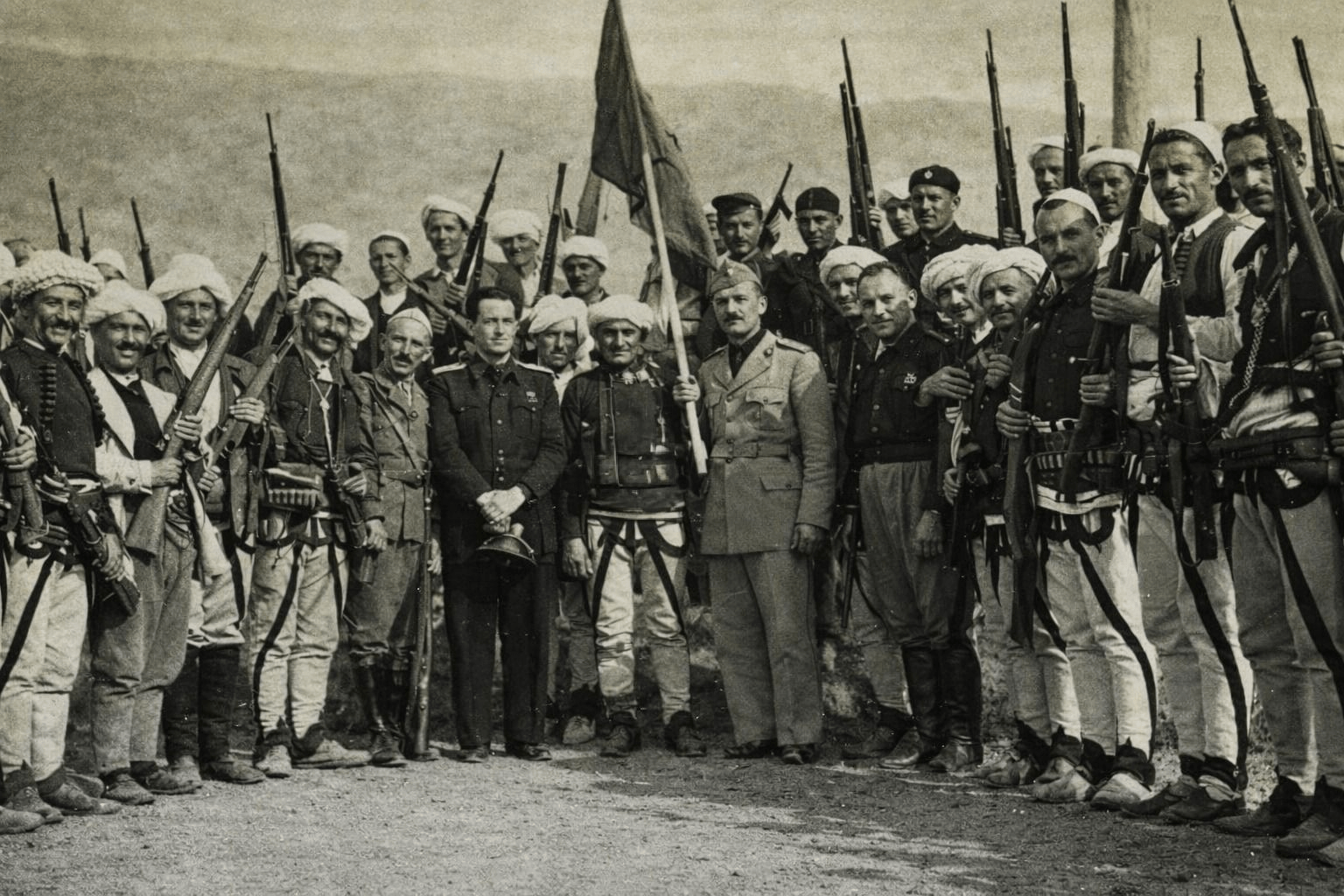 Photo from 1942: Albanian fighters Sak Faslia, Kolë Bibë Mirakaj, Bajram Gashi, Shaban Basha, Salih Canë Ukella, Sahit Mehmei of Loxha, Sali Rama Kelmendi, Ymer Zeneli Lajqi, Ramë Syla Muriqi, Ramë Beka Muriqi, Shaban Rrust Rugova and Rrust Sadri Elezi Rugova, and Imer Zenel Lajçi from Pepaj of Rugova, Imer Zenel Lajçi, and Syl Mehmeti Nikq