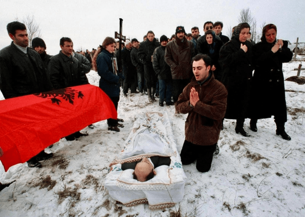Catholic Albanians mourning a murdered relative who was killed by Serbs in 1998-1999