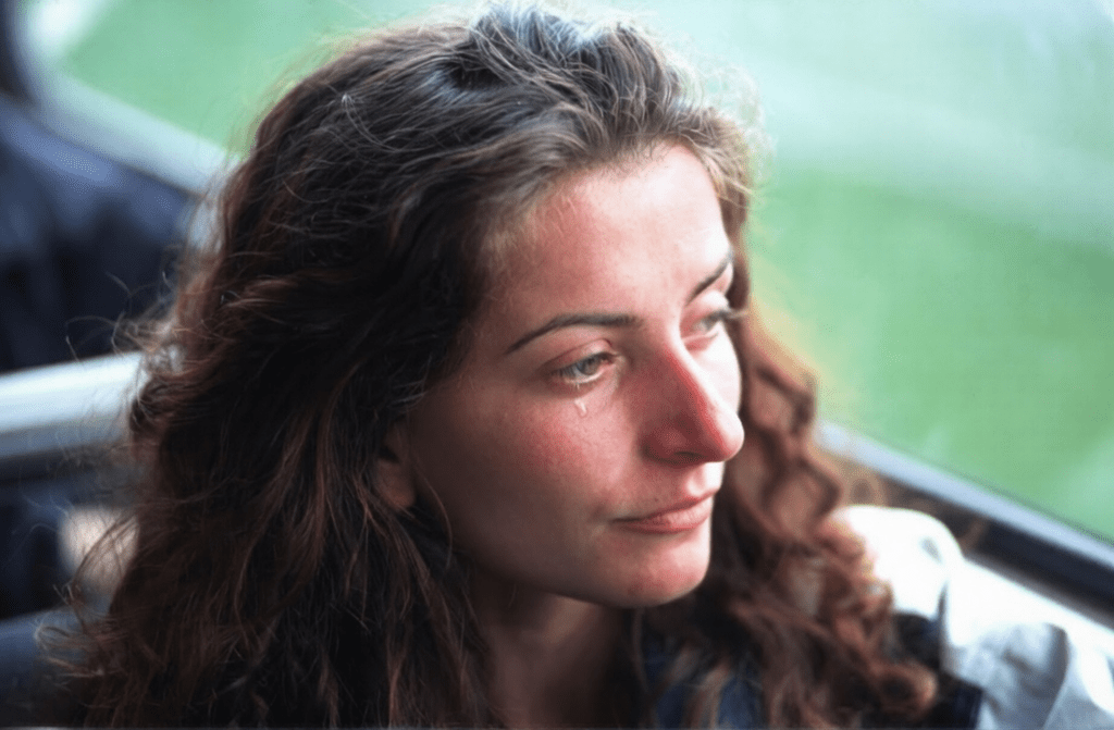 Serbian terrorists force a crying Albanian woman to flee from her homeland on April 13,&nbsp;1999