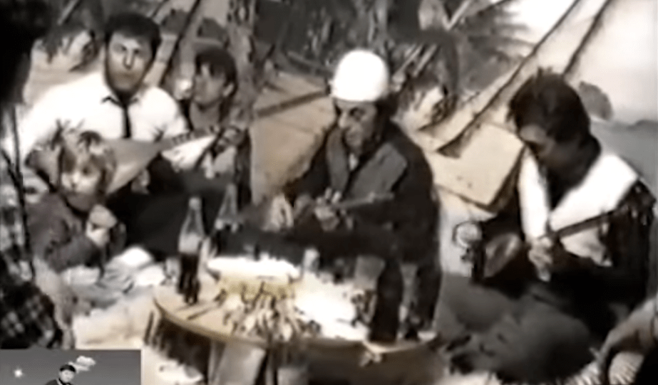 A Table, a Rifle, and a Rising Line: Dramatic Architecture in Albanian Rhapsodic Performance with Augustin Uka and Gjergj Uka